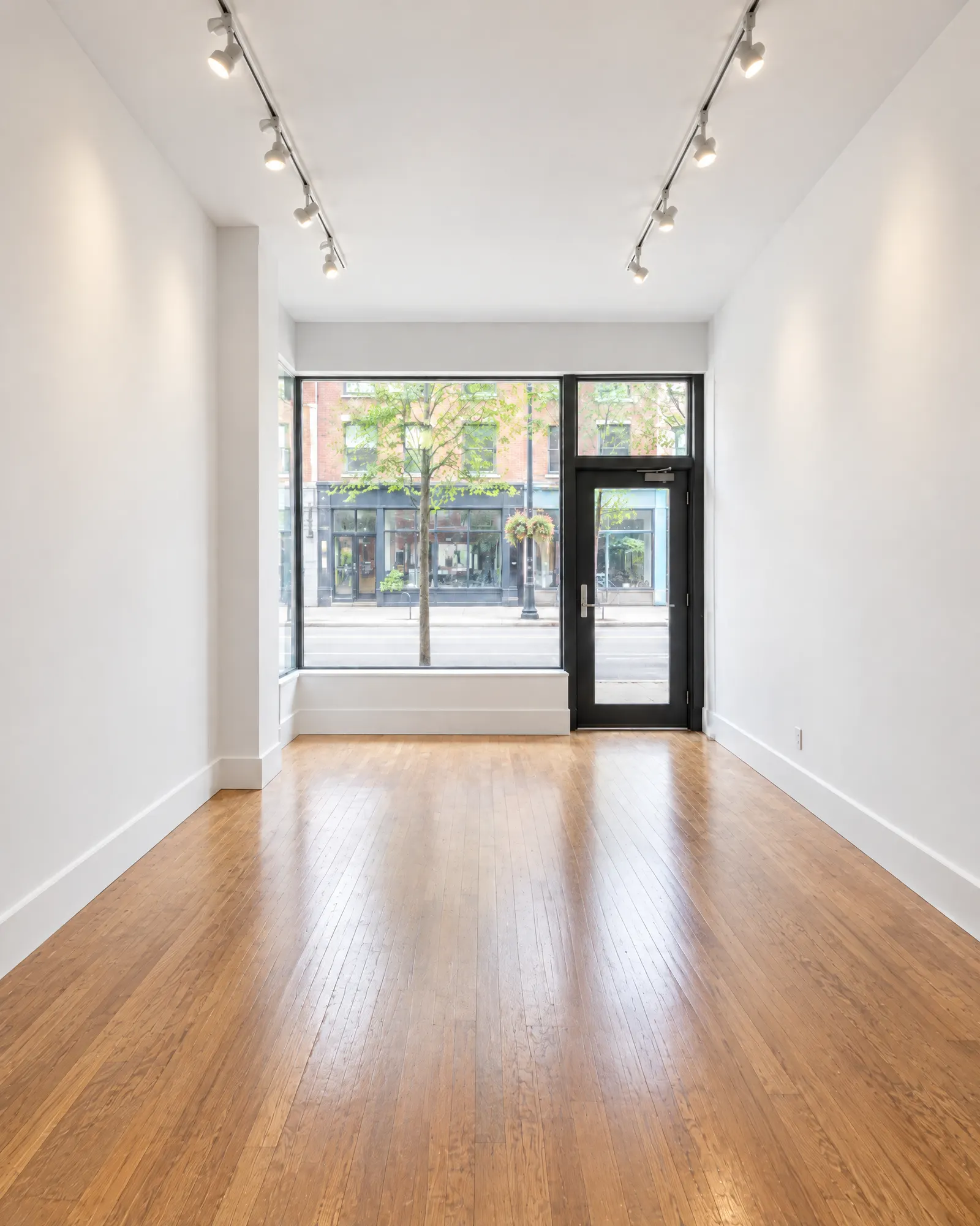 Empty storefront interior, before and after repainting (after)